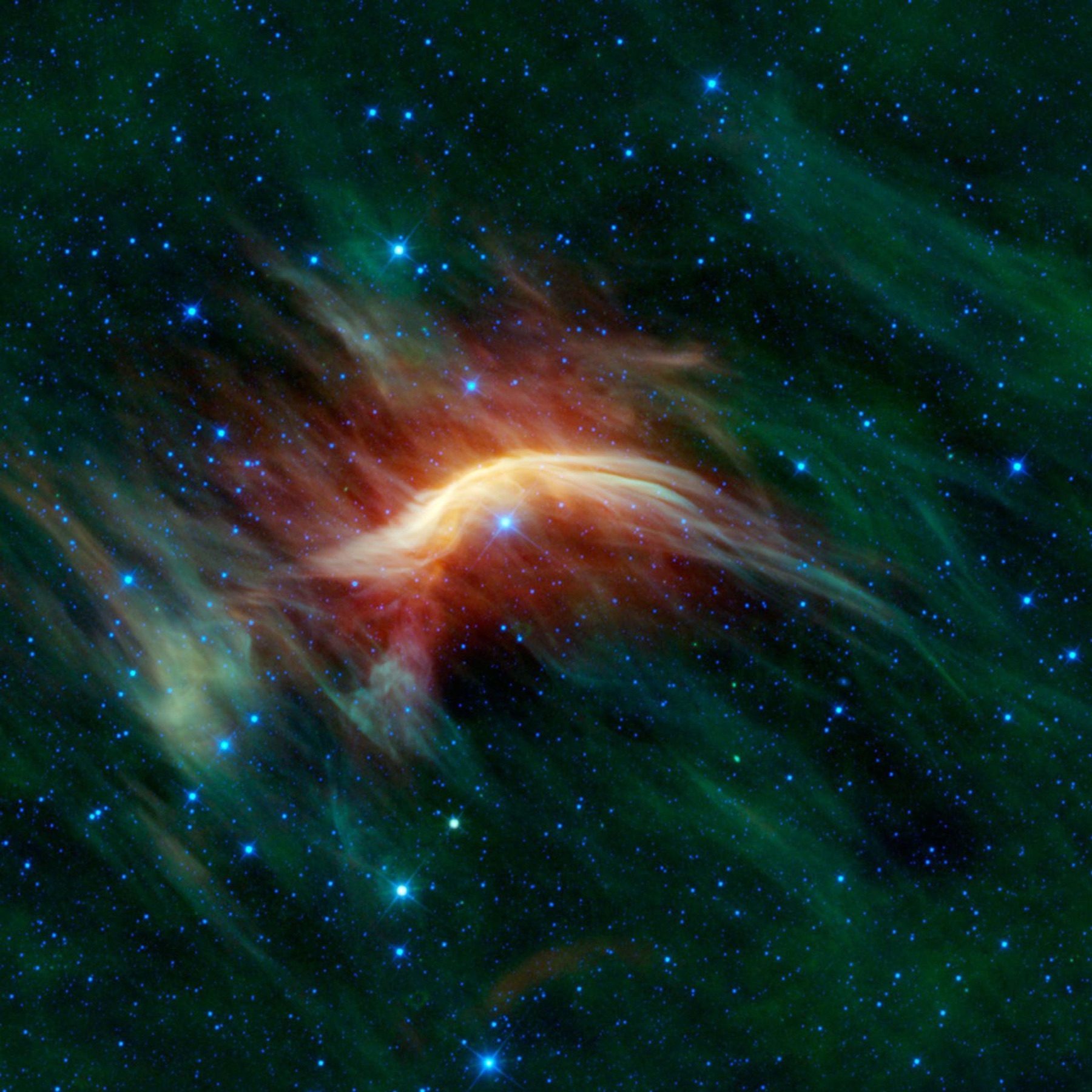 Zeta Ophiuchi traversant un nuage de gaz et de poussière interstellaires, observée en infrarouge par le télescope WISE
